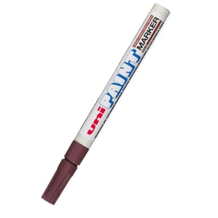 A white Uni Paint px20 Brown marker, adorned with a blue and red logo and text, is arranged diagonally with its brown cap at the bottom left.